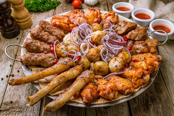platter of different kebabs