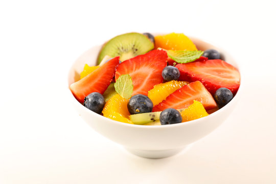 bowl fruit salad isolated on white background