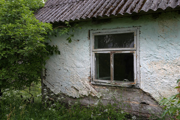 The old ruined and abandoned house in the countryside