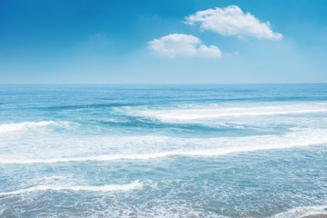 Fototapeta na wymiar Aerial shot of the ocean. Blue ocean waves panorama