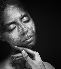 Fashion black and white photo of girl with artistic makeup