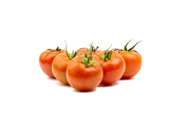 Tomato closeup on white background. Selective focus and crop fragment