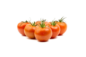 Tomato closeup on white background. Selective focus and crop fragment