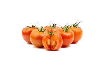 Tomato closeup on white background. Selective focus and crop fragment