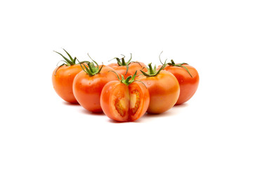Tomato closeup on white background. Selective focus and crop fragment