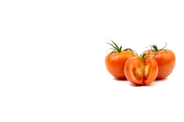 Tomato closeup on white background. Selective focus and crop fragment