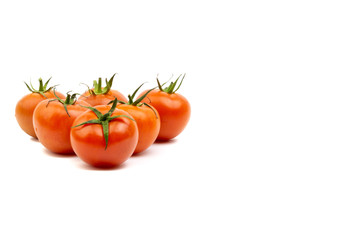 Tomato closeup on white background. Selective focus and crop fragment