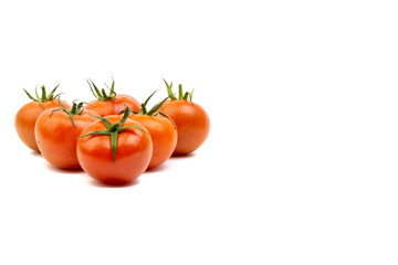 Tomato closeup on white background. Selective focus and crop fragment