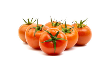 Tomato closeup on white background. Selective focus and crop fragment