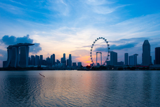 Singapore business district city skyline sunset view from Marina bay iconic place.