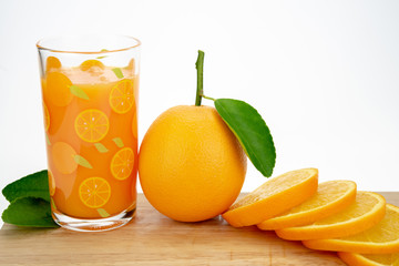Orange juice and oranges with leaves