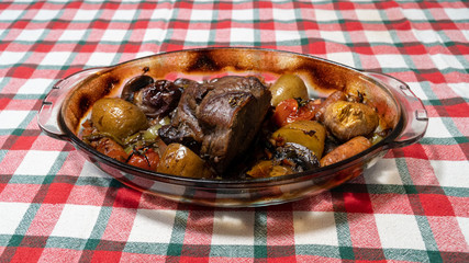 Homemade roasted beef topside with cherry tomatoes,oregano,garlic,carrot and onion