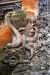 Fototapeta na wymiar Elements of traditional Balinese stone carving exterior ornament