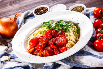 Pasta with tomato sauce and sausage