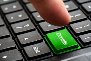 Donate button on keyboard, selective focus , concept word