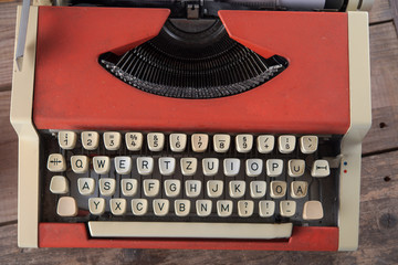 Red typewriter close-up, top view