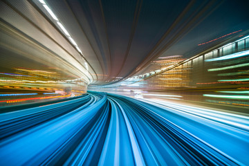 Fototapeta na wymiar Motion blur from Yurikamome Line moving inside tunnel in Tokyo, Japan