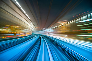 Motion blur from Yurikamome Line moving inside tunnel in Tokyo, Japan