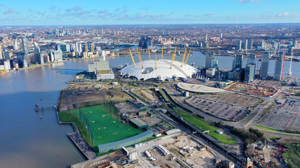 Aerial drone bird's eye view of iconic concert Hall of O2 Arena in Greenwich Peninsula, London, United Kingdom - obrazy, fototapety, plakaty
