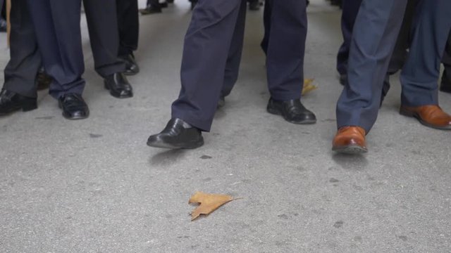 Processional parades in Holy Week, feet of men with shoes