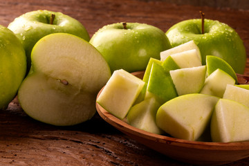 Ripe green apples on table close up