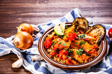 Roasted meat, groats and vegetables