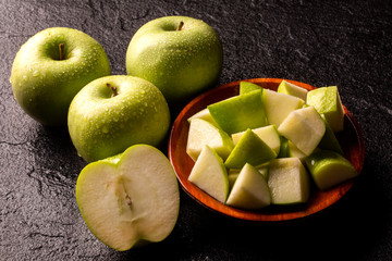 Ripe green apples on table close up