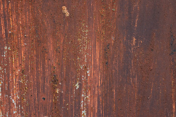 Macro texture of peeled paint on rusty iron closeup.