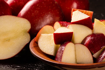 Ripe red apples on table close up