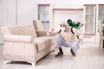 Pest control contractor working in the flat