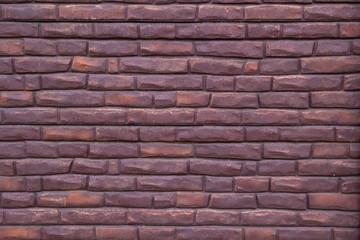 Background of purple bricks. Construction Materials