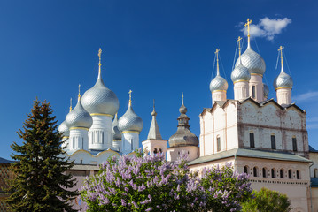 Fototapeta na wymiar Domes of the Kremlin cathedrals of Rostov the Great on a Sunny spring day. Golden ring, Russia