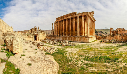 Fototapeta premium Ancient Roman temple of Bacchus with surrounding ruins of ancient city, Bekaa Valley, Baalbek, Lebanon