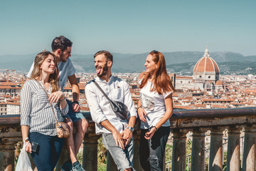 Travel to Europe. Happy friends, tourist in Italy. Landscape skyline of Florence. Basilica di Santa Maria del Fiore.