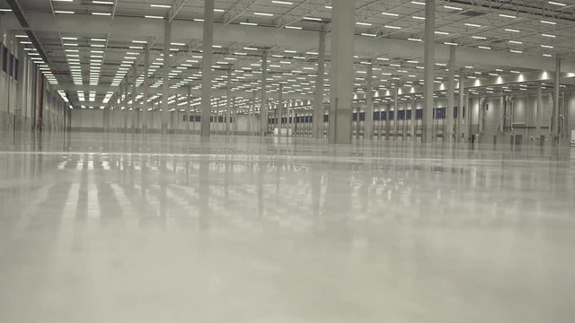 Warehouse interior empty smooth footage from dolly shot