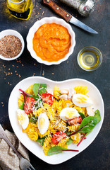 pasta with cheese and manhold