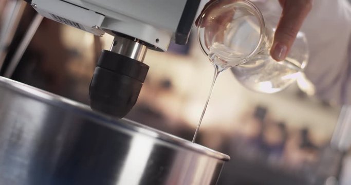 Laboratory experiment in front of shiny blurry background