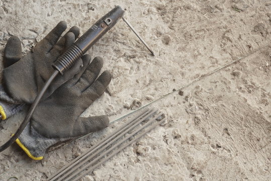welding equipment, welding electrodes, high voltage wires with clips, set of accessories for arc welding and mittens 