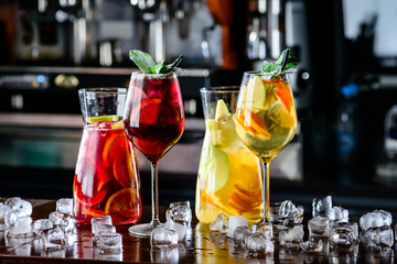 sangria with red and white wine Summer alcohol drink and ingredients. - obrazy, fototapety, plakaty