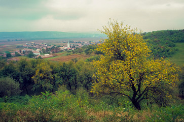 Fototapeta premium Autumn view of the village of Curteni, close to the city of Targu Mures in Transylvania, Romania.