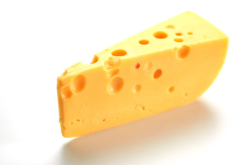 Cheese with big holes on a white background