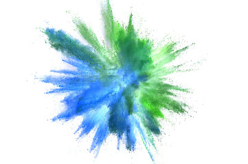 Colored powder explosion. Abstract closeup dust on backdrop. Colorful explode. Paint holi
