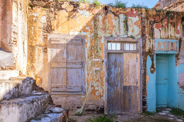 Fototapeta na wymiar Greece, Kea island. Traditional abandoned and ruined building in capital city of Ioulis