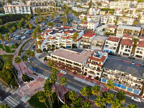 Aerial view of San Clemente city and coastline cliff before sunset time. San Clemente city in Orange County, California, USA. Travel destination in the South West coast. Wealthy villas area.