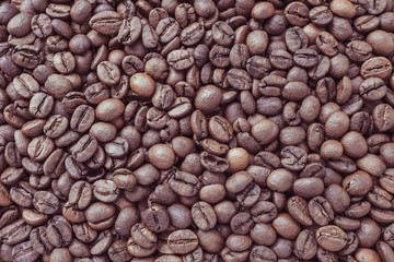 Roasted coffee beans background tinted