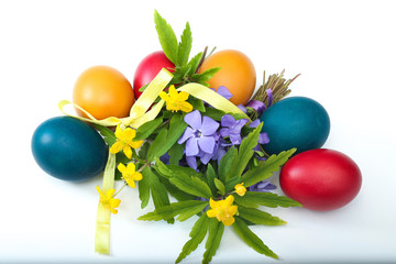 Top view of flower Bouquet and six painted easter eggs