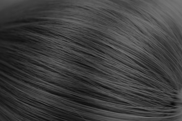 Texture close-up long straight hair black color