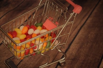 multi-colored jelly beans in a shopping trolley