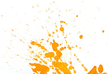 paint drops splatter on white orange background