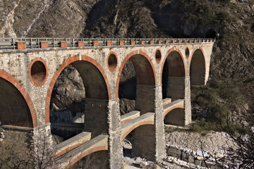 Apuan Alps, Carrara, Tuscany, Italy. March 28, 2019. Ancient bridge in the marble quarries.